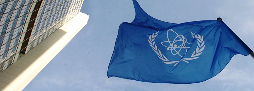 The IAEA’s flag flies in front of its headquarters in Vienna. 