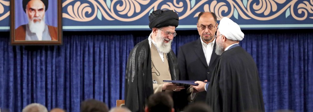 Ayatollah Seyyed Ali Khamenei endorsed President Hassan Rouhani for his second term in a ceremony in Tehran on August 3.	