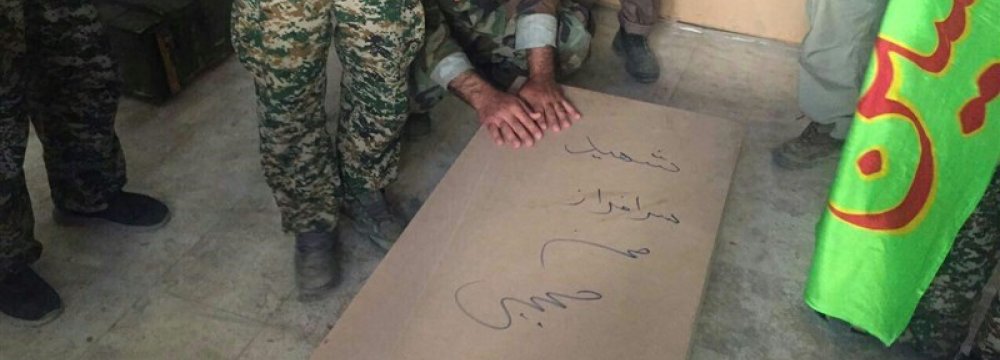 Hezbollah Receives Body of Iranian Martyr From IS