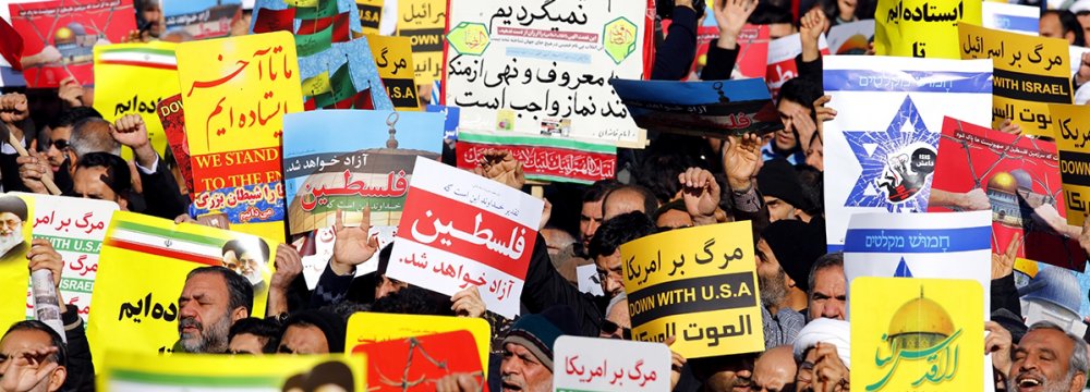 People in Tehran hold a pro-Palestinian demonstration after the Friday prayers.