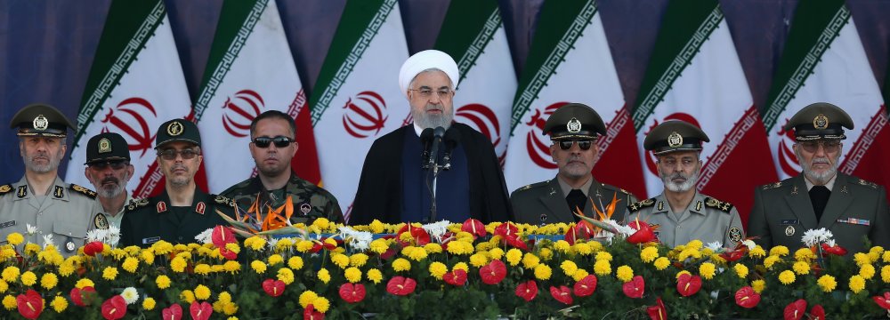 Hassan Rouhani speaks during a ceremony  in Tehran on Saturday to mark the start of the 1980-88 Iran-Iraq war. 