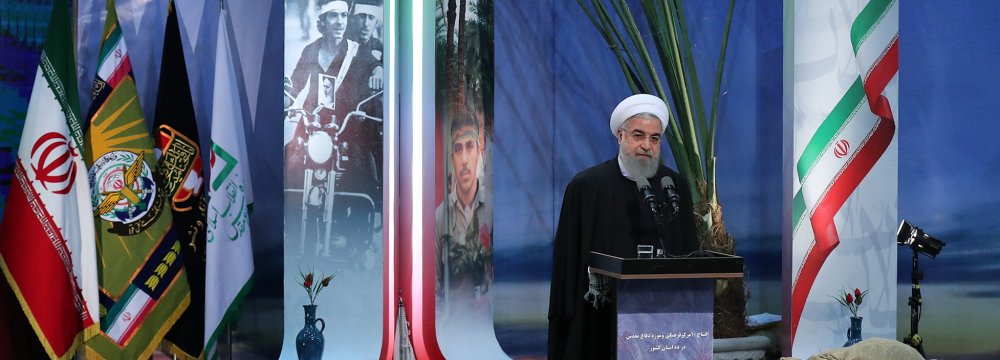 President Hassan Rouhani speaks at a ceremony in Tehran on Feb. 4 to inaugurate cultural centers and war museums across the country. 
