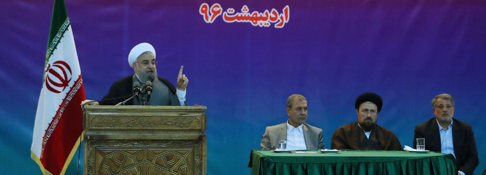 President Hassan Rouhani addresses a gathering of workers in Tehran on May 1.