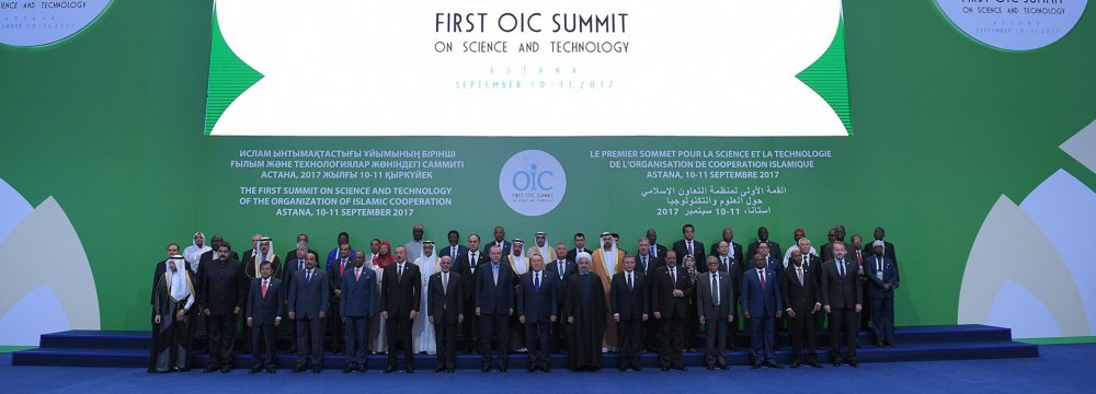 Heads of state and government from OIC member states pose for a family photo during the First OIC Summit on Science and Technology in Astana, Kazakhstan, on Sept. 10.