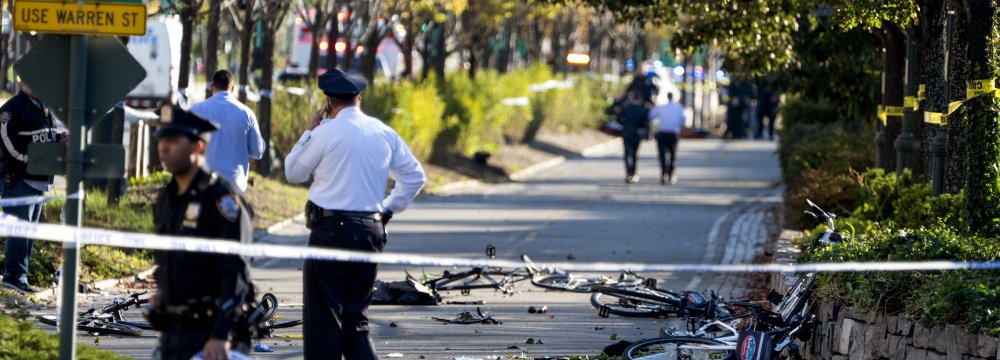 Bicycles and debris lay on a bike path after a motorist drove onto the path near the World Trade Center memorial killing eight people on November 1.
