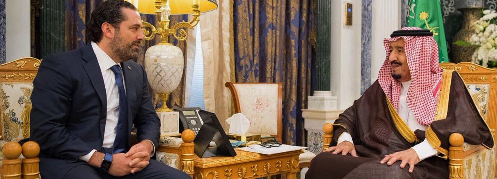 Saudi King Salman (R) meets with outgoing Lebanese Prime Minister Saad Hariri in Riyadh, Saudi Arabia, Nov. 6.