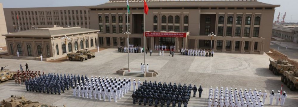 Chinese People’s Liberation Army personnel attend the opening ceremony of China’s new military base in Djibouti, Aug. 1.