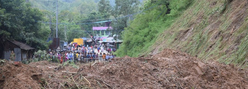 Rescuers Battle to Reach Victims of Bangladesh Landslides