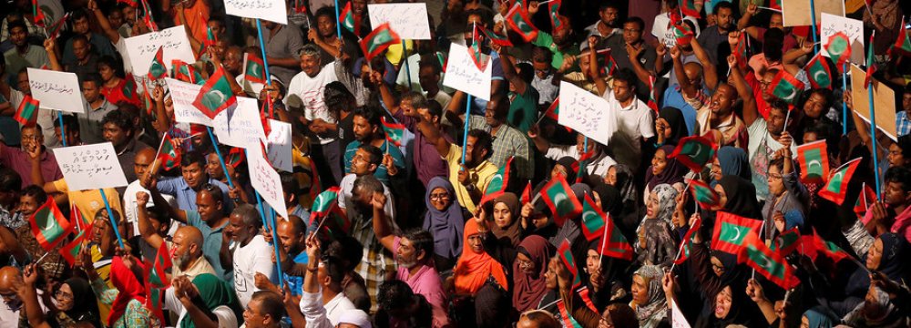Opposition supporters protest the government’s delay in releasing jailed leaders in Male, Maldives, on February 4.
