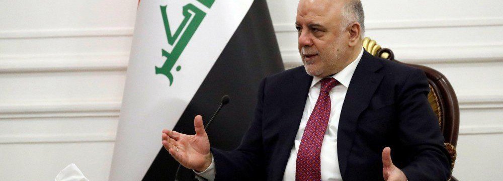 Iraqi Prime Minister Haider al-Abadi, whose domestic prestige has been sharply boosted by the return of territories disputed with the Kurds to federal control, meets US Secretary of State (not pictured) in Baghdad, on October 23.