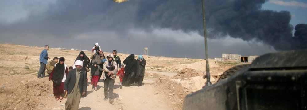 Iraqis flee Mosul, Iraq. (File Photo)