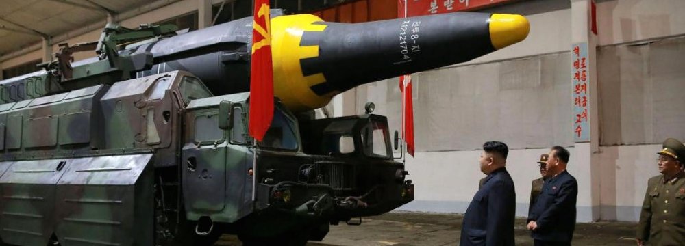 North Korean leader Kim Jong Un inspects the long-range strategic ballistic missile (File Photo)
