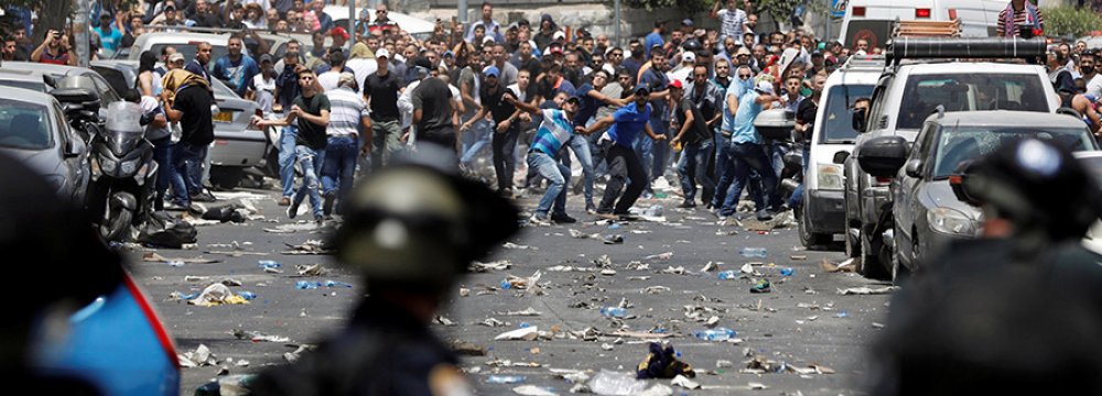 Palestinians clash with Israeli security forces outside  Beit-ul-Moqadass on June 21.