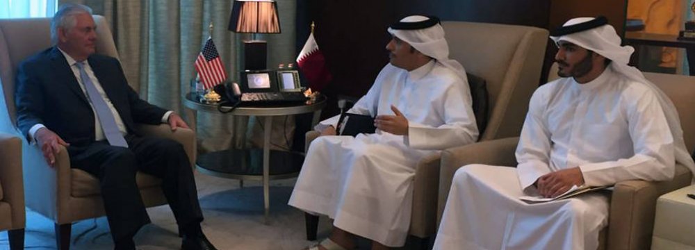 US Secretary of State Rex Tillerson meets Qatar’s Foreign Minister Sheikh Mohammed bin Abdulrahman  al-Thani (2nd R) in Doha, Qatar on July 11.
