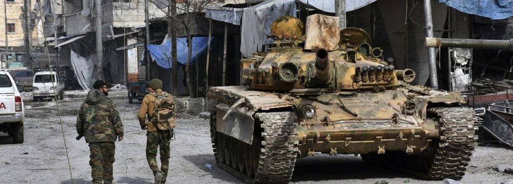 Militants Evacuate Enclave in Southwestern Syria