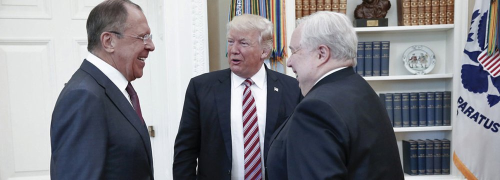 (L-R) Sergey Lavrov, Donald Trump and Sergey Kislyak at the White House, Washington, DC, May 10