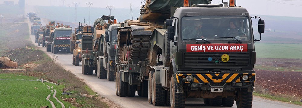 A convoy of Turkish military vehicles on their way  to Syria’s Aleppo Province