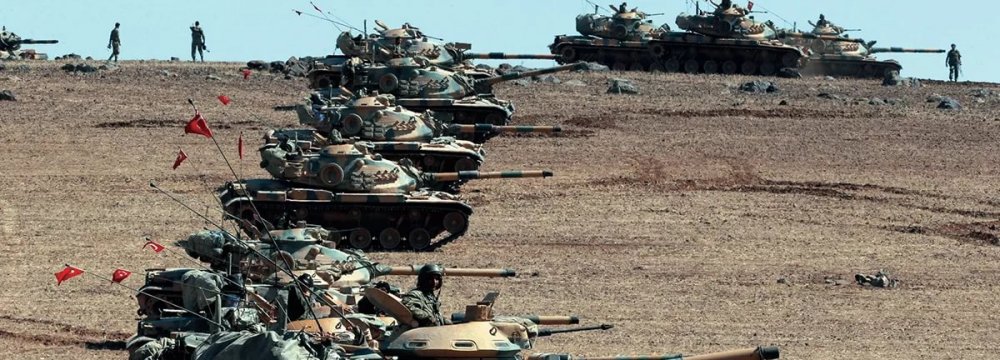 Turkish tanks have taken up position on the Turkish-Iraqi border.