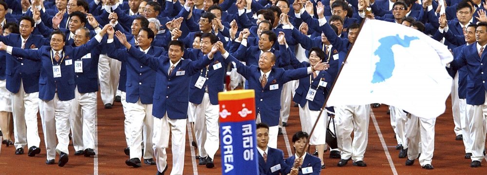 North and South Korea united in a moment of solidarity when the two sides marched together for the first time in the Sydney Olympics in 2000.