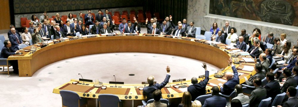 The United Nations Security Council votes to pass a new sanctions resolution against North Korea during a meeting at UN headquarters on Sept. 11