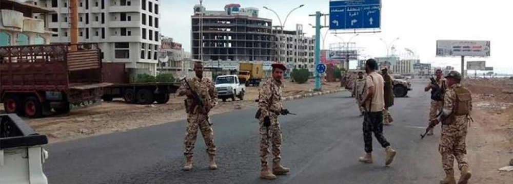 Witnesses said there was heavy security deployment in Aden, and that schools, government service buildings and most shops were shut down. 