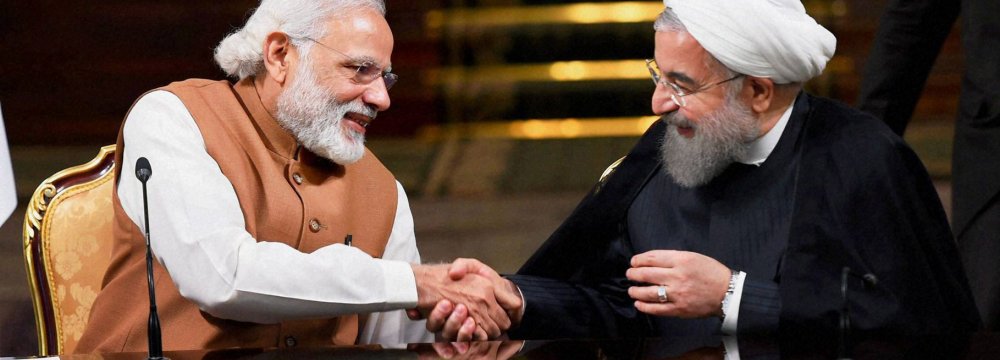 Indian Prime Minister Narendra Modi (L) shakes hands with Iran’s President Hassan Rouhani in Tehran on May 23, 2016. (File Photo)