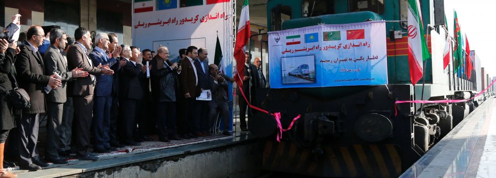 Iranian officials welcome the arrival of the first train connecting China and Iran at Tehran’s train station on February 15, 2016.