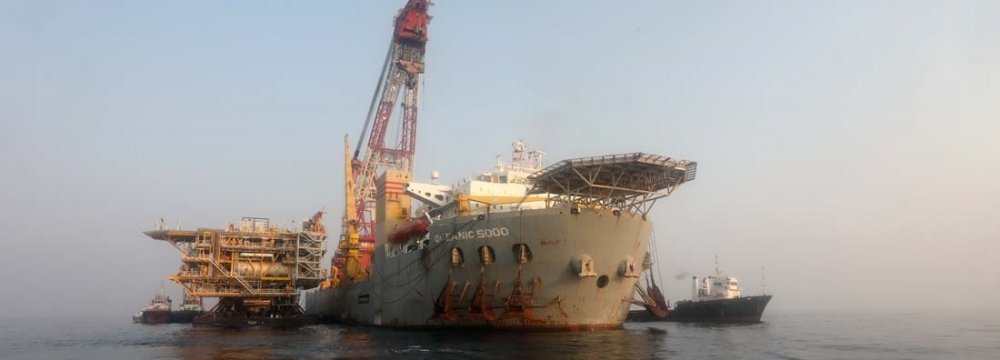 [An offshore South Pars platform undergoing installation in the Persian Gulf.