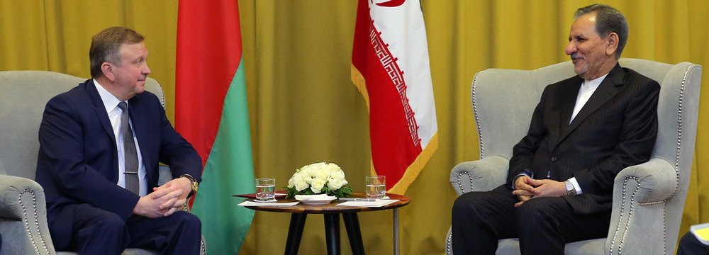 First Vice President Es’haq Jahangiri (R) meets Belarus Prime Minister Andrei Kobyakov.