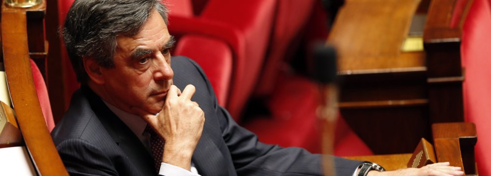 French Socialists Vote  as Turmoil Engulfs Fillon