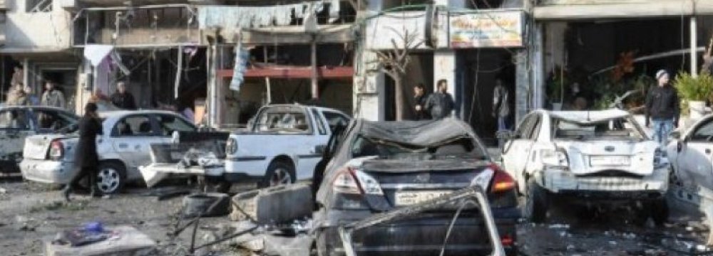 Suicide Attacks Kill  Dozens in Homs