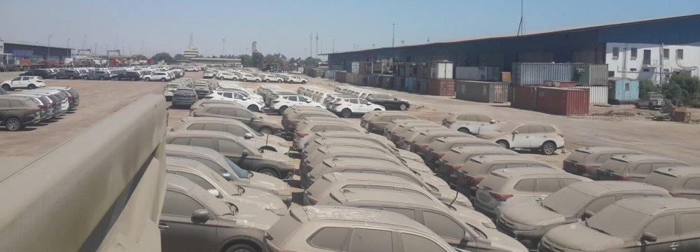 by December 26, 13,700 cars were stuck in customs.
