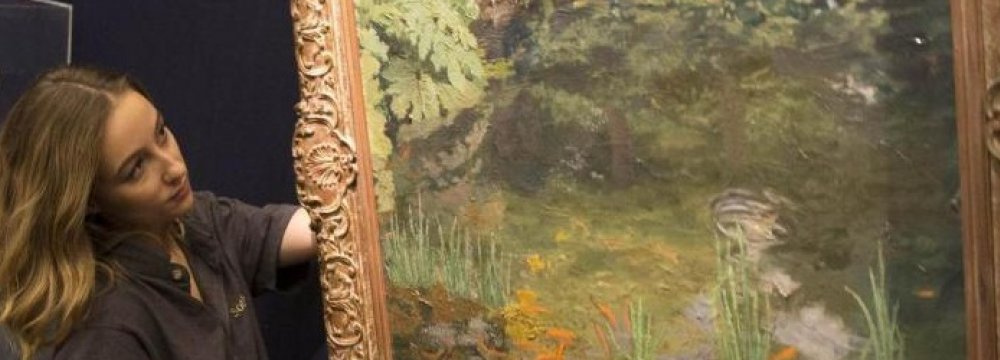 The painting depicts the goldfish pond at Churchill’s Chartwell home