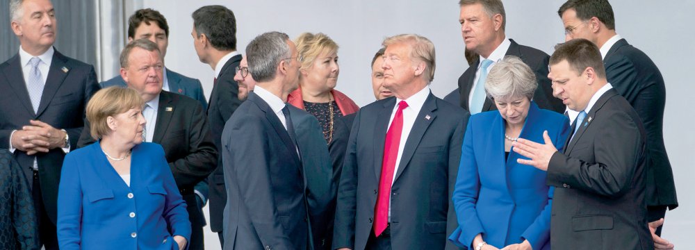 Trump Turmoil Hangs Over Tense NATO Summit 