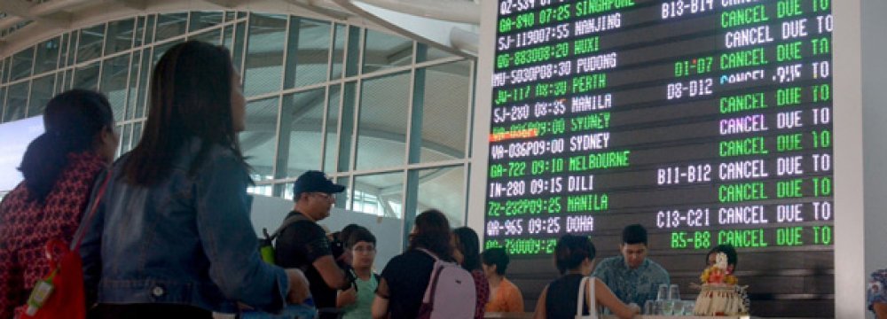 Bali Airport Reopens as Volcanic Danger Passes  