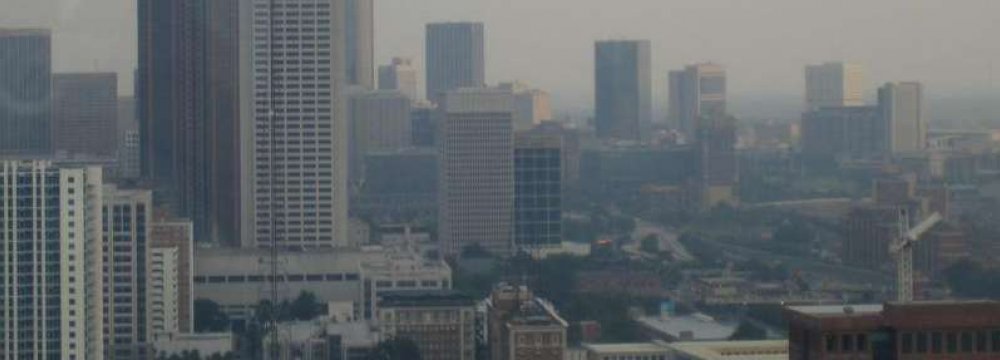 Cool Roofing Materials Worsen Air Pollution