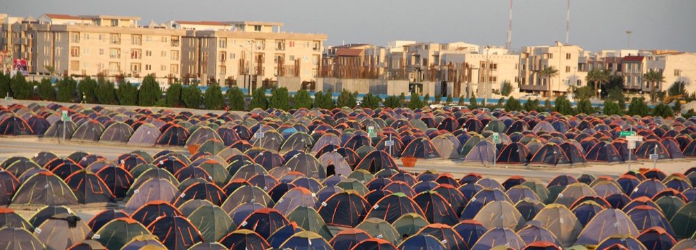 Many Norouz travelers opt to pitch their tents in campsites.