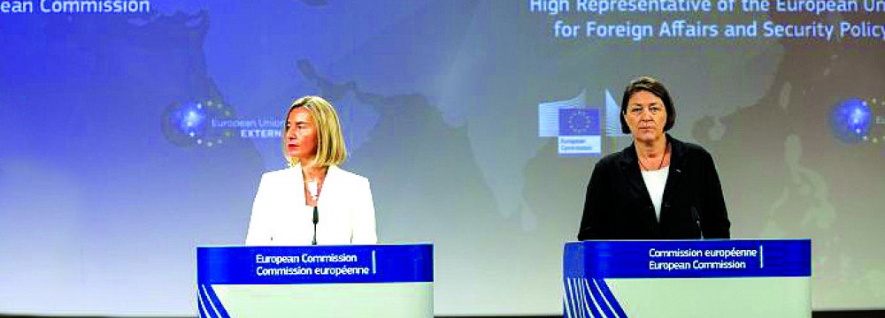 EU foreign affairs chief Federica Mogherinia (L) and Transport Commissioner Violeta Bulc present the proposal  for an EU strategy for connecting Europe and Asia.