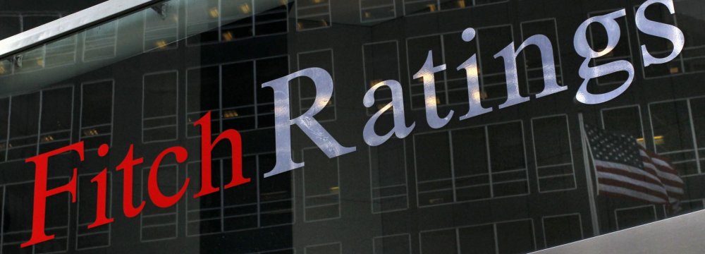Fitch says China’s economic growth has come at the cost of delayed reforms.