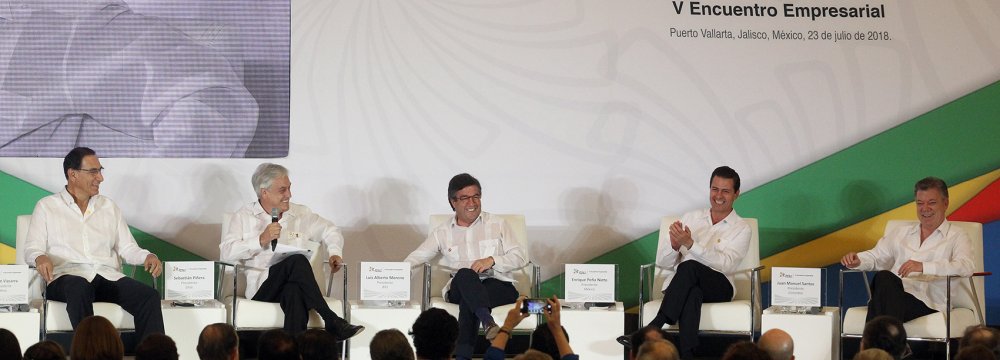 (L - R) Peruvian President Martin Vizcarra, Chilean President Sebastian Pinera, the president of the Inter-American Development Bank Luis Alberto Moreno, Mexican President Enrique Pena Nieto and Colombian President Juan Manuel Santos, at the Business Meeting  of the Pacific Alliance in Mexico on Monday.