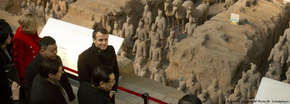 Emmanuel Macron visits the terracotta sculptures depicting 8,000-man clay army, crafted around 250 BC for the tomb of China’s first emperor  Qin Shihuang, January 8.