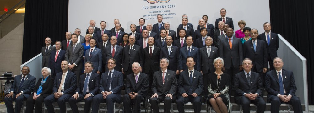 G20 Finance Ministers and Central Bank Governors pose for a family photo on the sidelines of the 2017 Spring Meetings of the World Bank  and IMF at IMF Headquarters in Washington, DC, April 21.