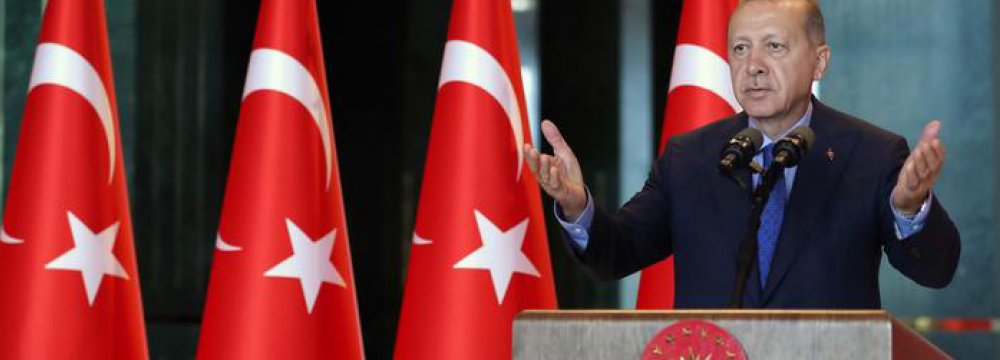 Erdogan Says Will Stick to Free Market Despite Economic Siege