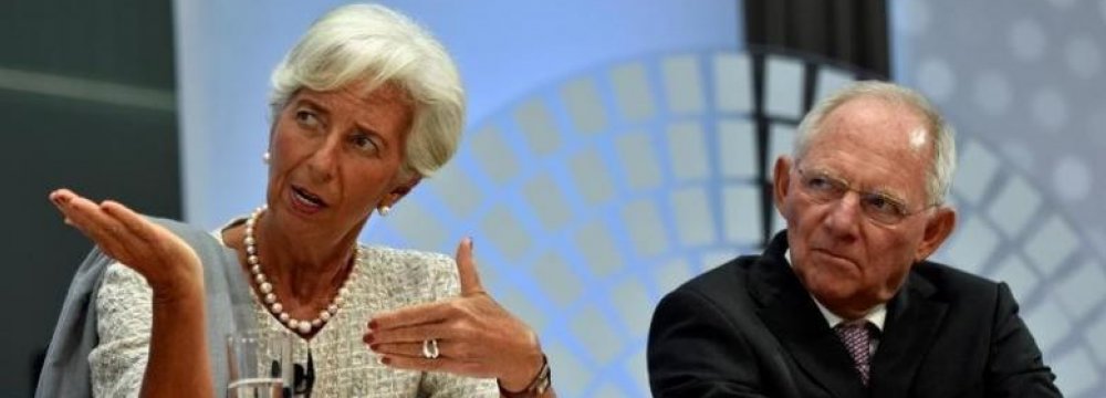 Christine Lagarde (L) and Wolfgang Schauble