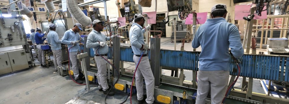 India’s March PMI Growth Slips to Five-Month Low