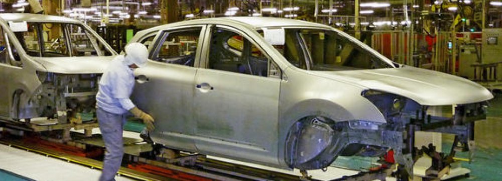 Output of cars and trucks fell by 14.1% in January.