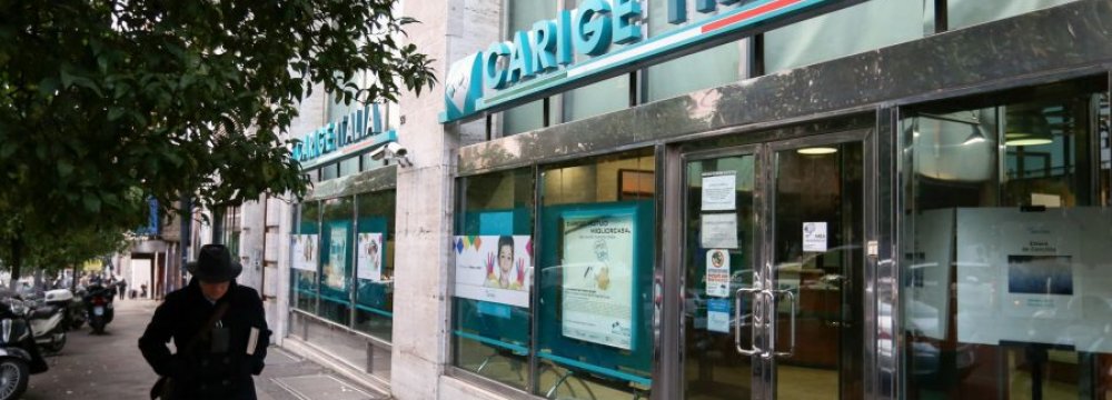 ECB has told Banca Carige to boost  capital and consider merger.