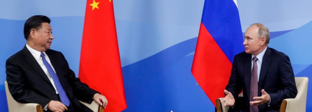 Russia, China Vow to Fight New Trade Barriers 