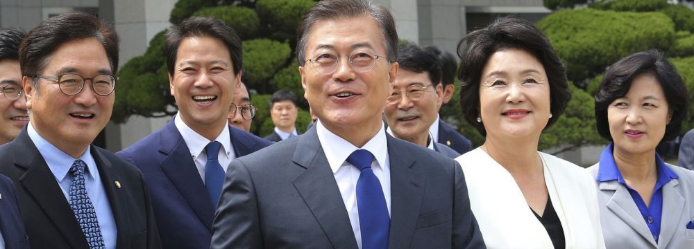 President Moon Jae-in has promised to increase the minimum wage to 10,000 won per hour before his five-year term  ends in May 2022. 