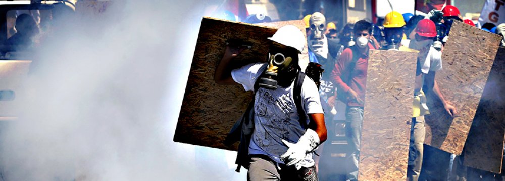 Turkish riot police clash with protesters in Silivri, near Istanbul, in 2013.